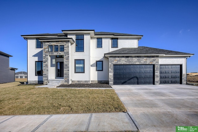 21108 Arlington St, Elkhorn, NE 68022 - prairie-style house with concrete driveway, a garage, a front yard, and stone siding