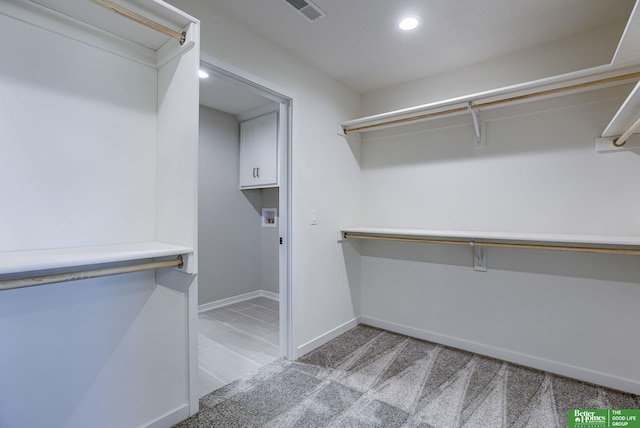 21108 Arlington St, Elkhorn, NE 68022 - walk in closet featuring light carpet