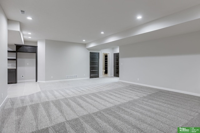 21108 Arlington St, Elkhorn, NE 68022 - unfurnished room with light carpet, baseboards, and recessed lighting