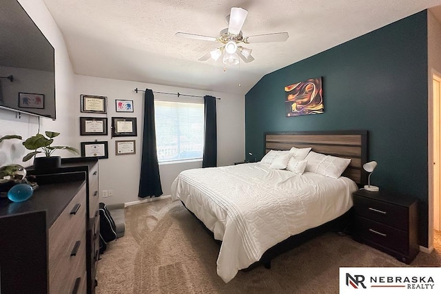 bedroom with carpet, vaulted ceiling, and a ceiling fan