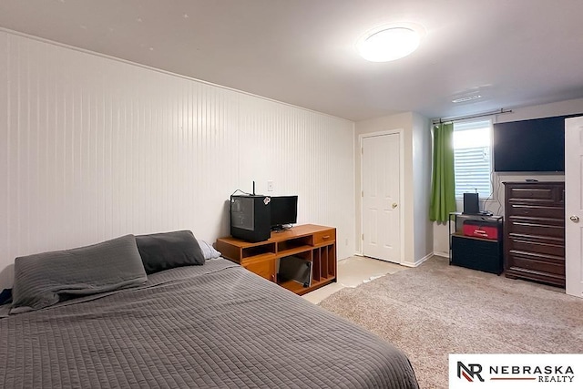bedroom with light carpet