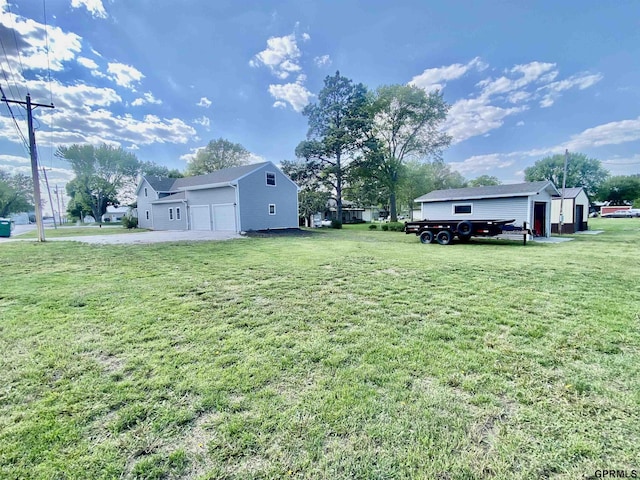 340 S Jefferson St, Bruning, NE 68322 - view of green lawn featuring a garage