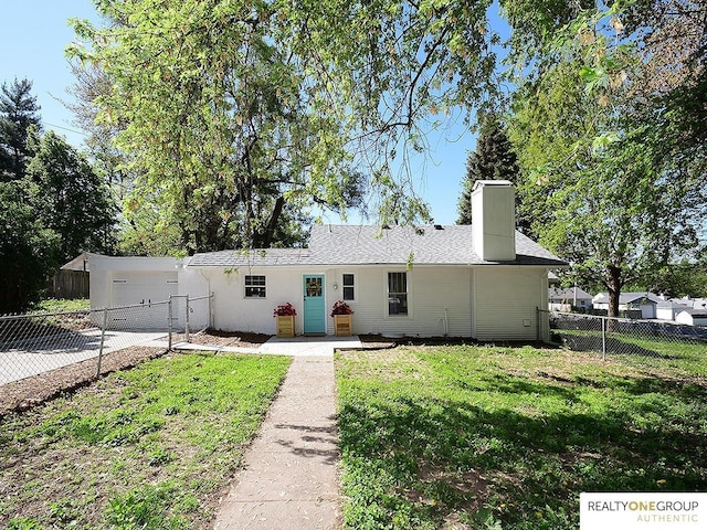 view of front of property featuring a chimney and driveway