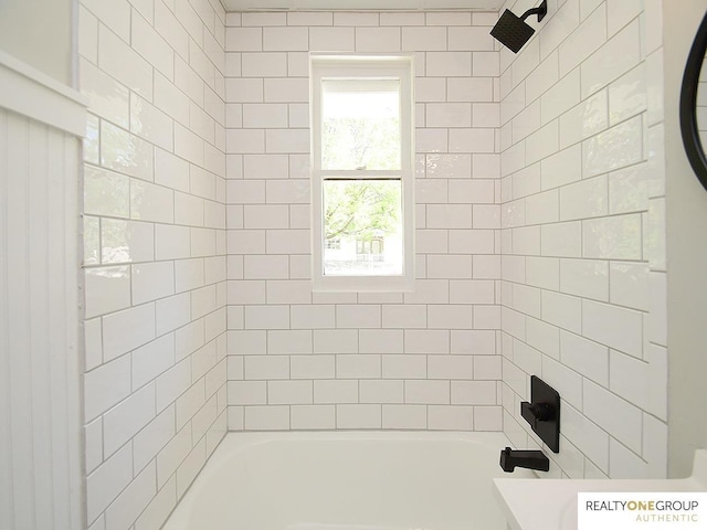 full bathroom with bathing tub / shower combination