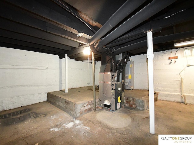 unfinished below grade area with gas water heater and heating unit