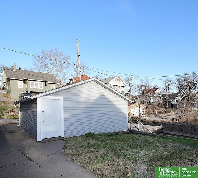 4210 S 21st St, Omaha, NE 68107 - view of outdoor structure featuring fence and an outbuilding
