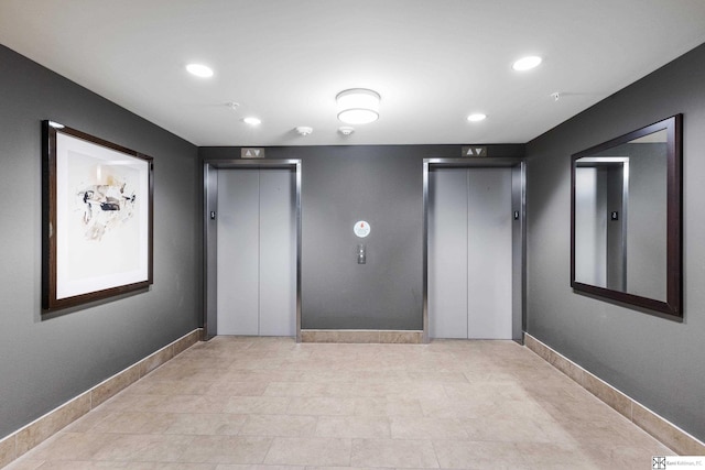 200 S 31st Ave Unit 4300, Omaha, NE 68131 - spare room featuring elevator, baseboards, and recessed lighting