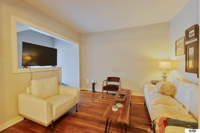 2939 Martha St, Omaha, NE 68105 - living area with wood-type flooring and baseboards
