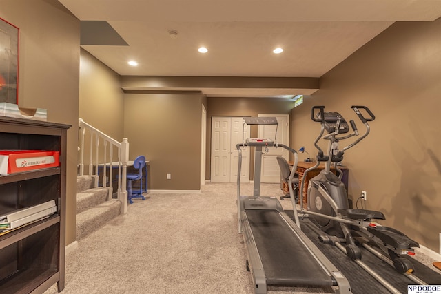 exercise room featuring carpet floors, recessed lighting, and baseboards