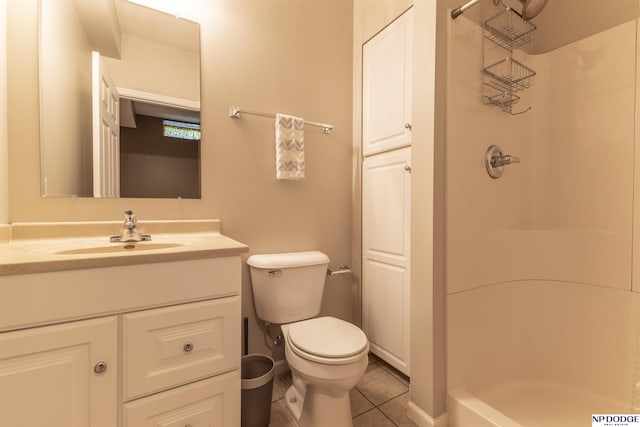 full bath with a shower, toilet, tile patterned flooring, and vanity