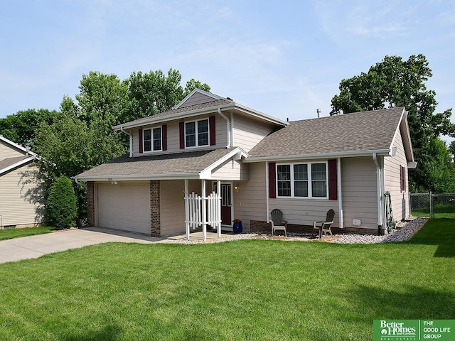 14824 Charles Plz, Omaha, NE 68154 - tri-level home with driveway, an attached garage, and roof with shingles