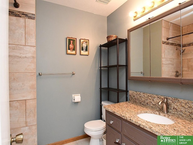 14824 Charles Plz, Omaha, NE 68154 - full bath featuring toilet, vanity, a tile shower, and baseboards