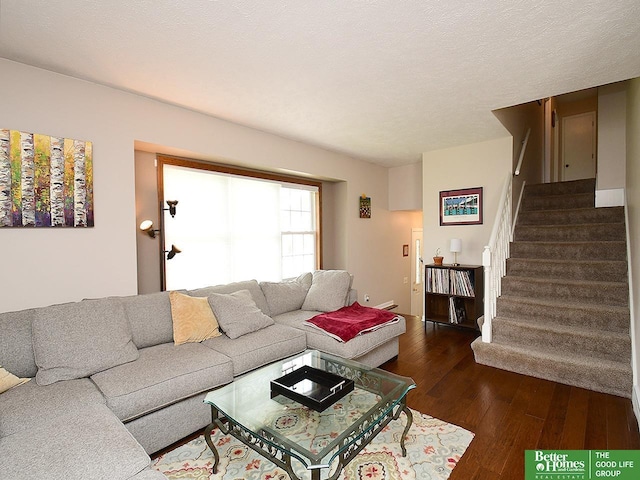 14824 Charles Plz, Omaha, NE 68154 - living area with dark wood-type flooring and stairs