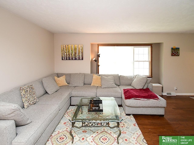 14824 Charles Plz, Omaha, NE 68154 - living area featuring dark wood-style flooring and baseboards