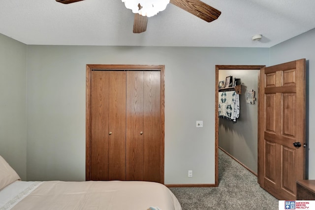 1714 S 14th Circle Dr, Beatrice, NE 68310 - carpeted bedroom featuring a closet, baseboards, and ceiling fan