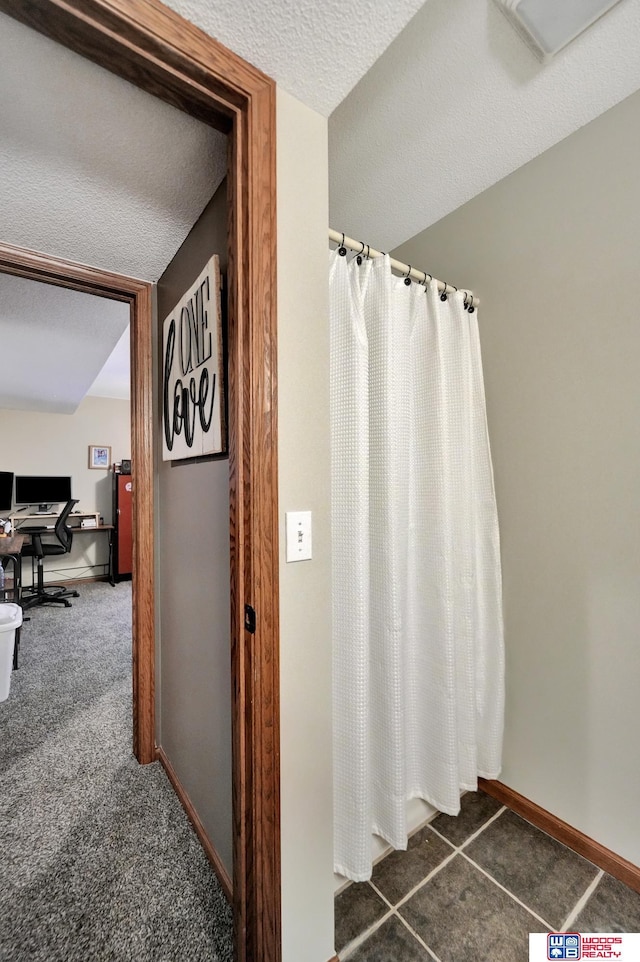 1714 S 14th Circle Dr, Beatrice, NE 68310 - full bath with baseboards and a textured ceiling