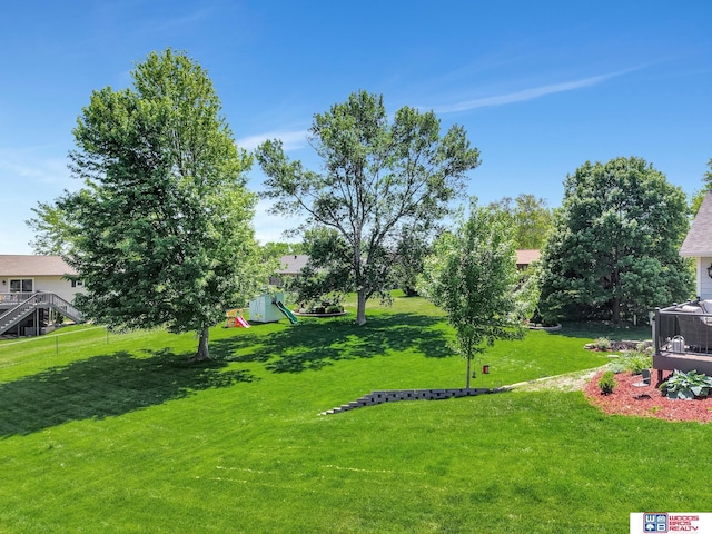 1714 S 14th Circle Dr, Beatrice, NE 68310 - view of grassy yard with a playground