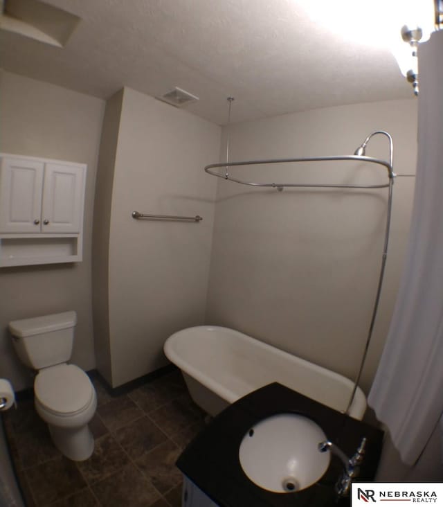 1941 J St, Lincoln, NE 68510 - full bath featuring toilet, a shower, and vanity