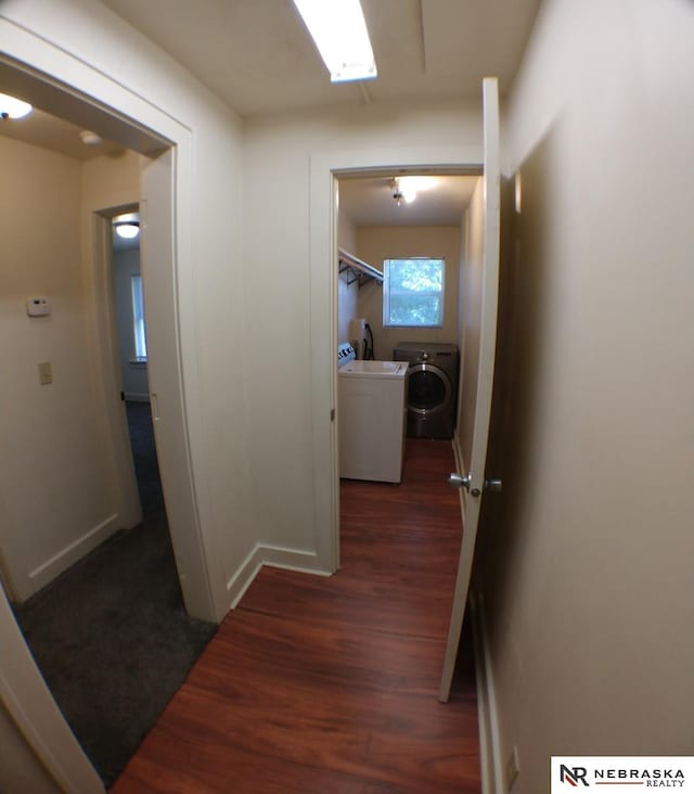 1941 J St, Lincoln, NE 68510 - hallway featuring wood finished floors, baseboards, and independent washer and dryer