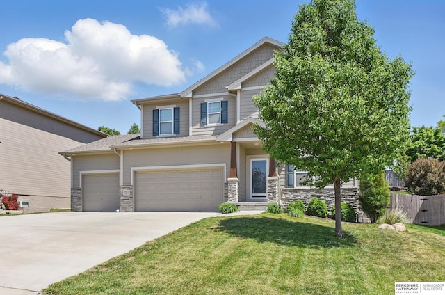 craftsman house with concrete driveway, stone siding, and an attached garage