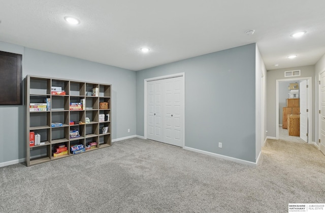 game room with carpet, recessed lighting, and baseboards