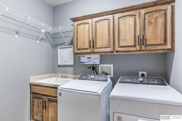 7309 S 196th Cir, Gretna, NE 68028 - laundry room featuring separate washer and dryer and cabinet space