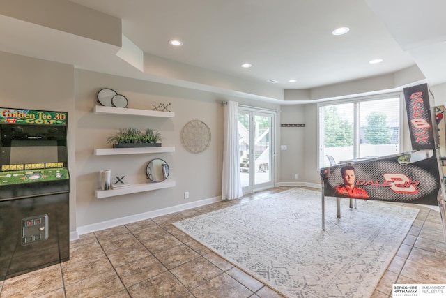 7309 S 196th Cir, Gretna, NE 68028 - living area with a tray ceiling, tile patterned flooring, recessed lighting, and baseboards