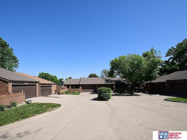 view of front of house featuring concrete driveway