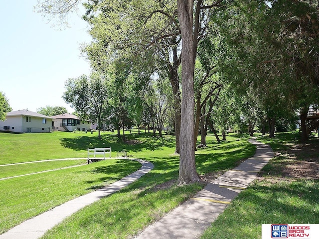surrounding community with a yard