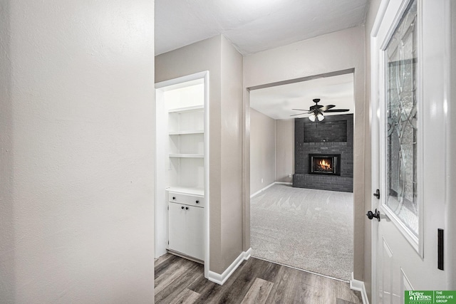 1405 E Linden Ave, Fremont, NE 68025 - corridor with dark wood-style floors and baseboards