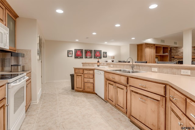 3835 S 179th Ter, Omaha, NE 68130 - kitchen featuring white appliances, a sink, light countertops, recessed lighting, and light tile patterned floors