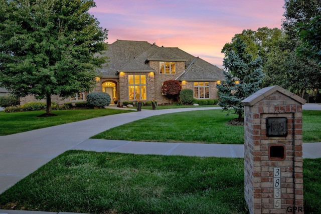 3835 S 179th Ter, Omaha, NE 68130 - french provincial home with a yard and stone siding