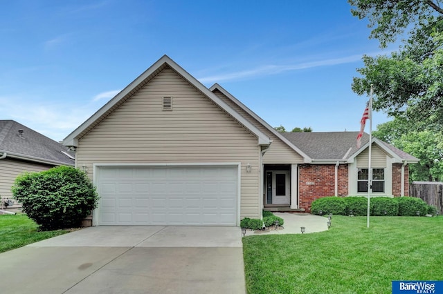 2727 N 75th St, Lincoln, NE 68507 - ranch-style home featuring concrete driveway, brick siding, and a garage
