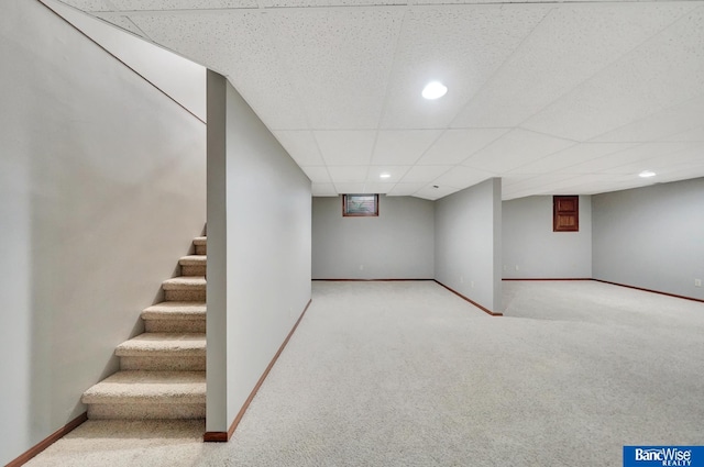 2727 N 75th St, Lincoln, NE 68507 - finished basement featuring carpet floors, stairs, baseboards, recessed lighting, and a drop ceiling