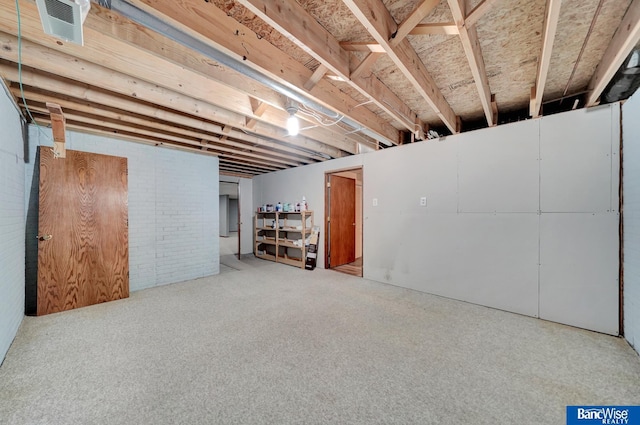2727 N 75th St, Lincoln, NE 68507 - unfinished below grade area with carpet floors