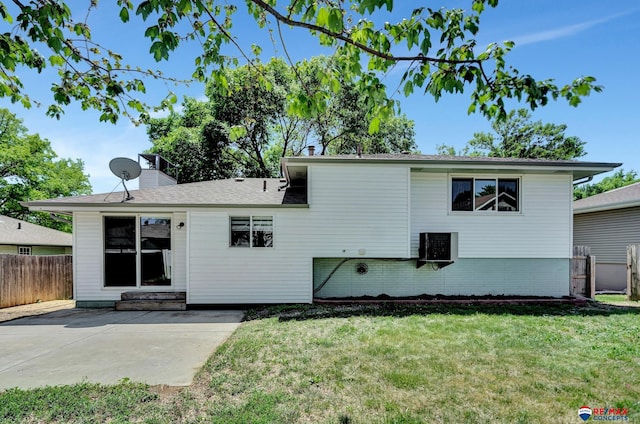 rear view of property featuring a patio and entry steps