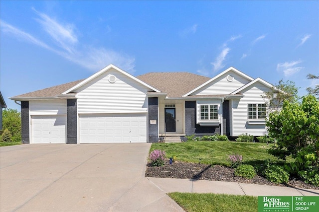 ranch-style house featuring concrete driveway, a garage, a front lawn, and brick siding