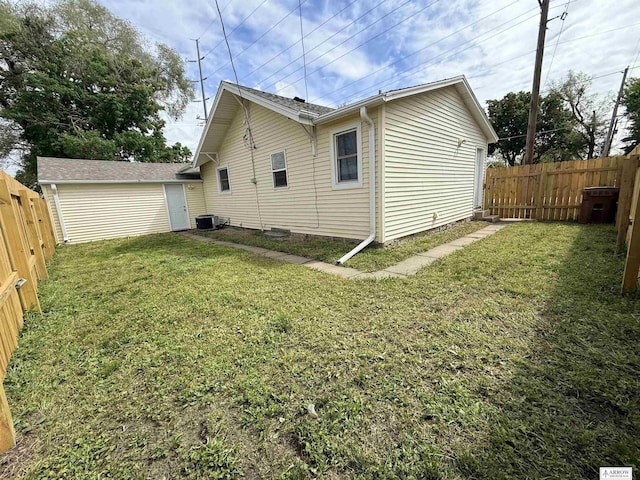 4227 N 57th St, Lincoln, NE 68507 - rear view of property with central air condition unit