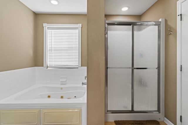 9002 N 156th Ave, Bennington, NE 68007 - full bathroom featuring a shower stall and a whirlpool tub