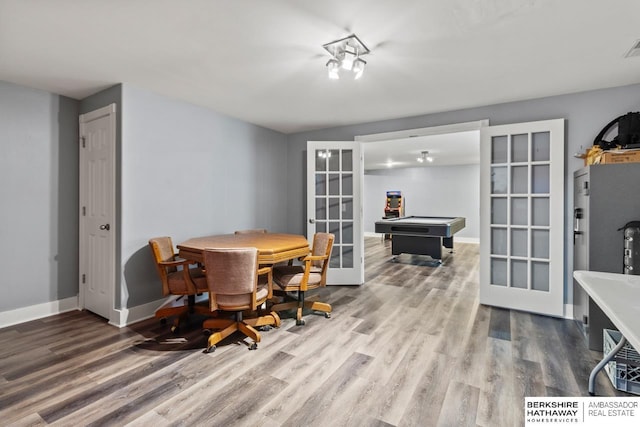 9002 N 156th Ave, Bennington, NE 68007 - dining room featuring french doors, wood finished floors, baseboards, and billiards