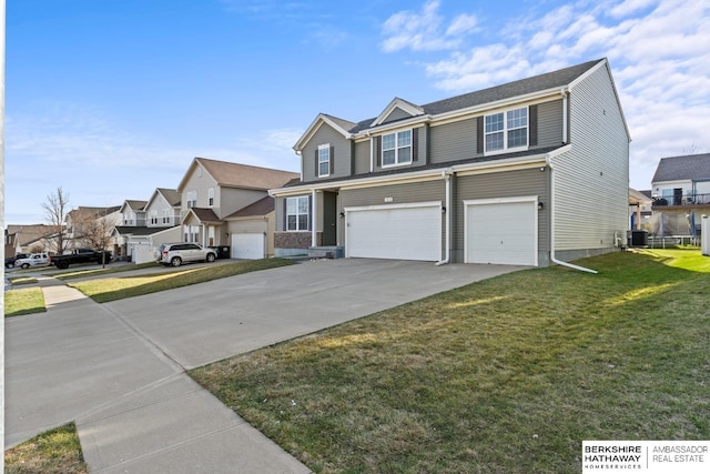 9002 N 156th Ave, Bennington, NE 68007 - view of front of property featuring a residential view, a garage, driveway, and a front lawn