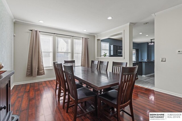 9002 N 156th Ave, Bennington, NE 68007 - dining room featuring ornamental molding, wood-type flooring, baseboards, and recessed lighting