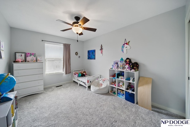 bedroom featuring carpet floors, baseboards, and ceiling fan