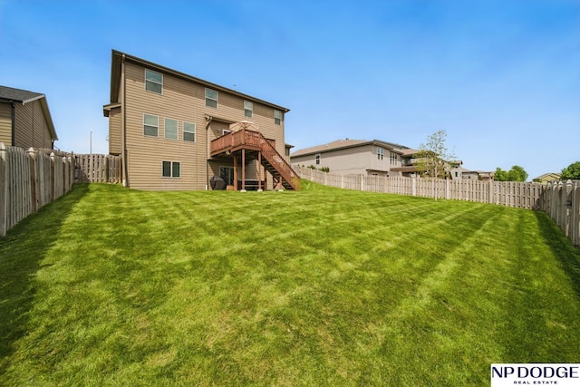 back of property with stairs and a wooden deck