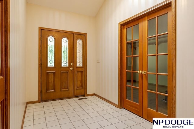 6630 Flint Ridge Rd, Lincoln, NE 68506 - foyer entrance with french doors and baseboards