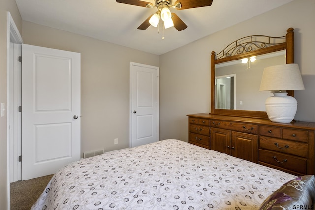carpeted bedroom with a ceiling fan