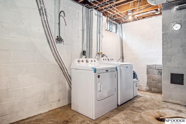 laundry area with separate washer and dryer