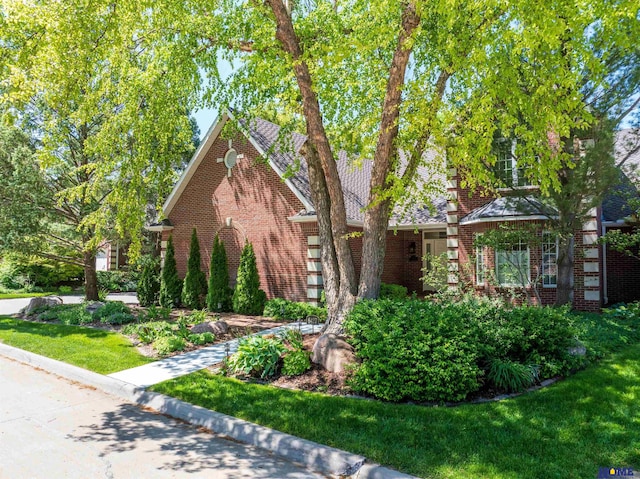 6427 Lone Tree Dr, Lincoln, NE 68512 - view of front of property featuring brick siding and a front yard