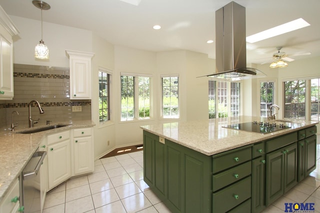 6427 Lone Tree Dr, Lincoln, NE 68512 - kitchen featuring green cabinets, a sink, black electric cooktop, island exhaust hood, and white cabinets