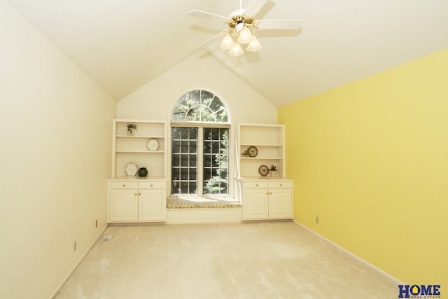 6427 Lone Tree Dr, Lincoln, NE 68512 - unfurnished room with baseboards, a ceiling fan, light carpet, and lofted ceiling